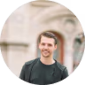 beautiful young man holding pretzel relaxing park 1